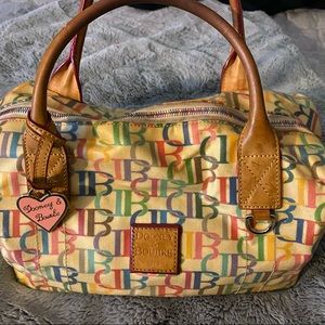 COPY - Dooney & Bourke to handle satchel